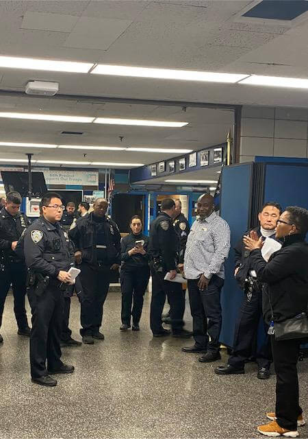 Officers lined up in a hallway