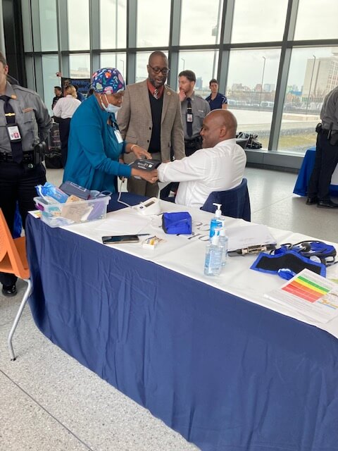 Volunteers at a screening table