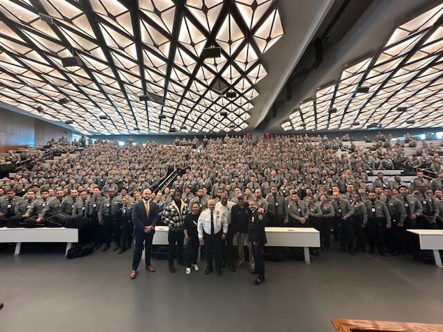 Large audience of officers in an auditorium